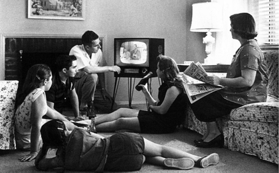 1024px-Family_watching_television_1958